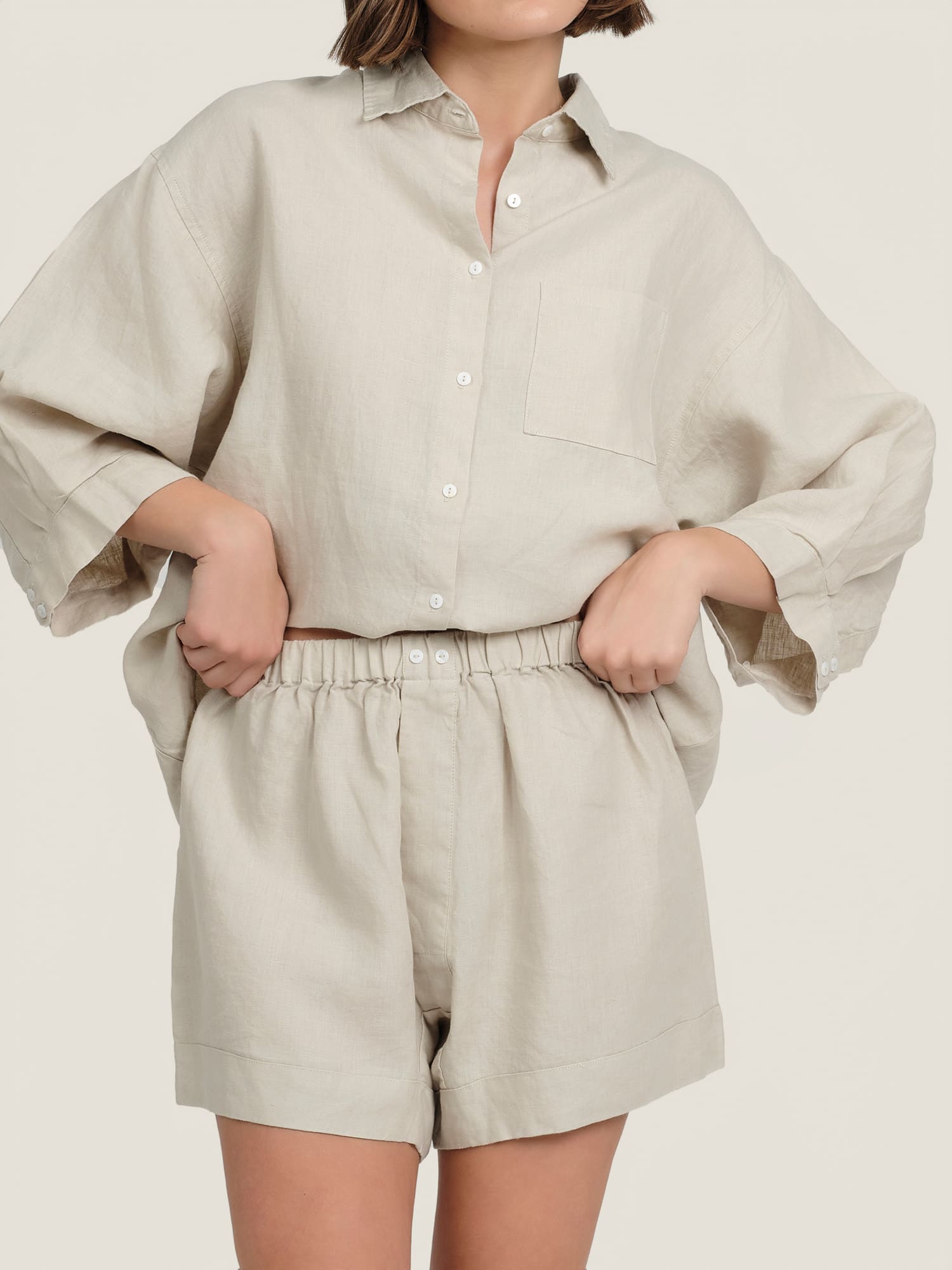 linen shorts in sand