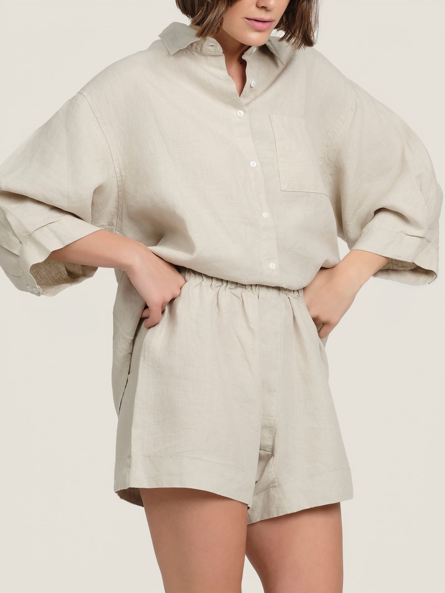 linen shorts in sand