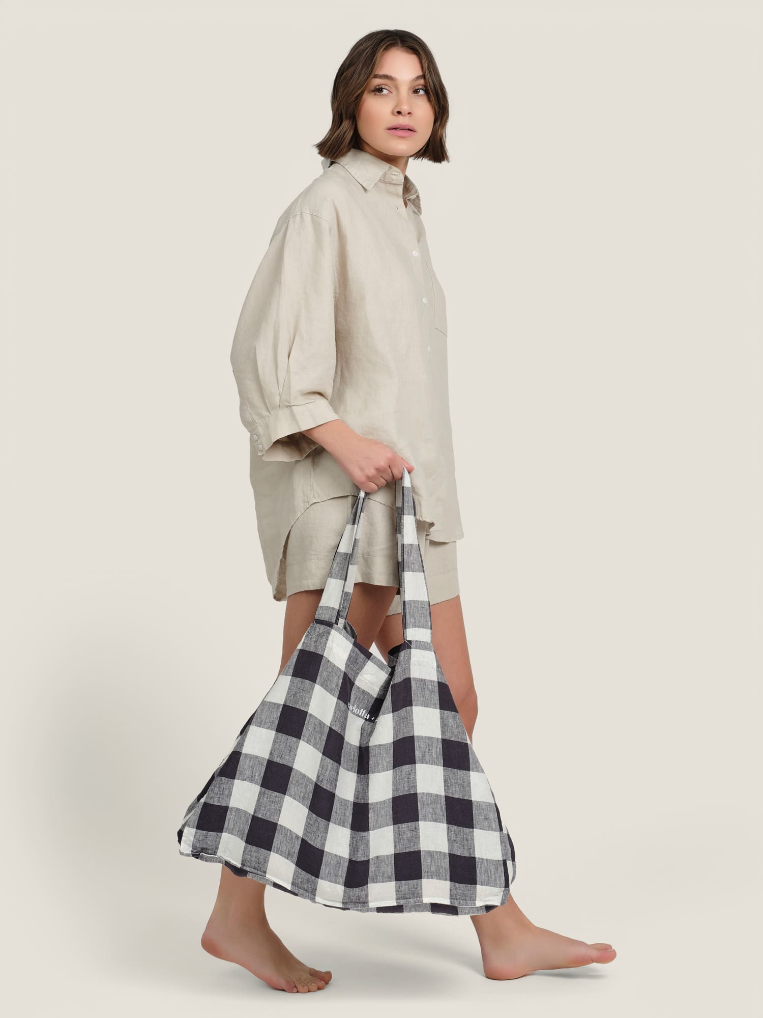 travel bag in navy gingham